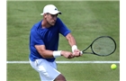 LONDON, ENGLAND - JUNE 08:  Farrukh Dustov of Uzbekistan in action during a qualifying match ahead of the AEGON Championships at Queens Club on June 8, 2014 in London, England.  (Photo by Jan Kruger/Getty Images)